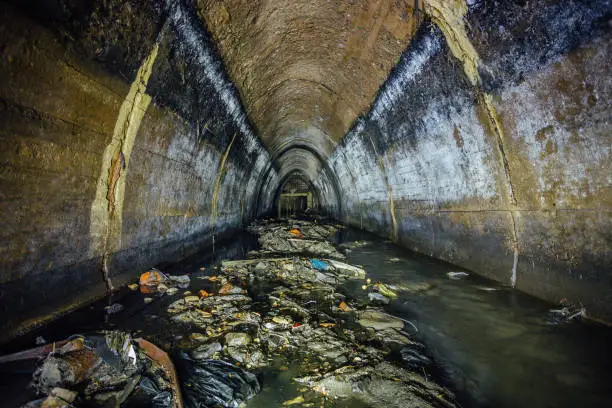 Photo of Flooded by dirty industrial wastewater sewage collector.