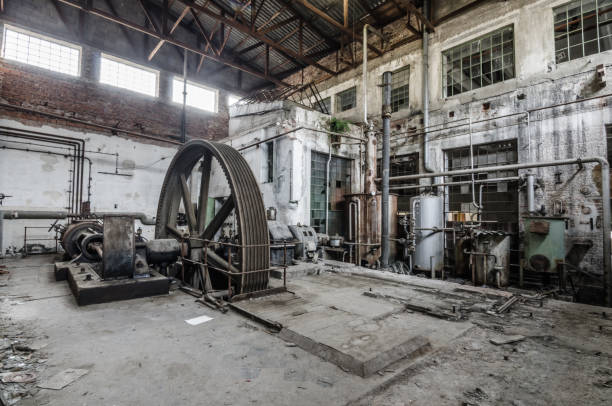 istock big wheel in abandoned factory 890874068