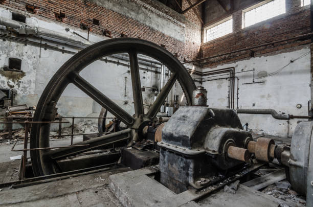 istock drive wheel with gear in old factory 890874076