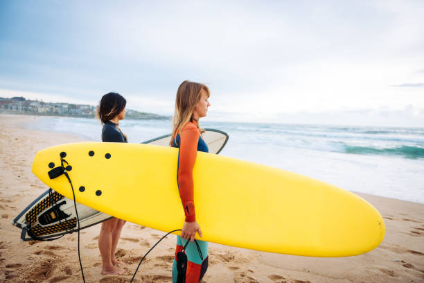 istock Friends going surfing in Australia 890886790