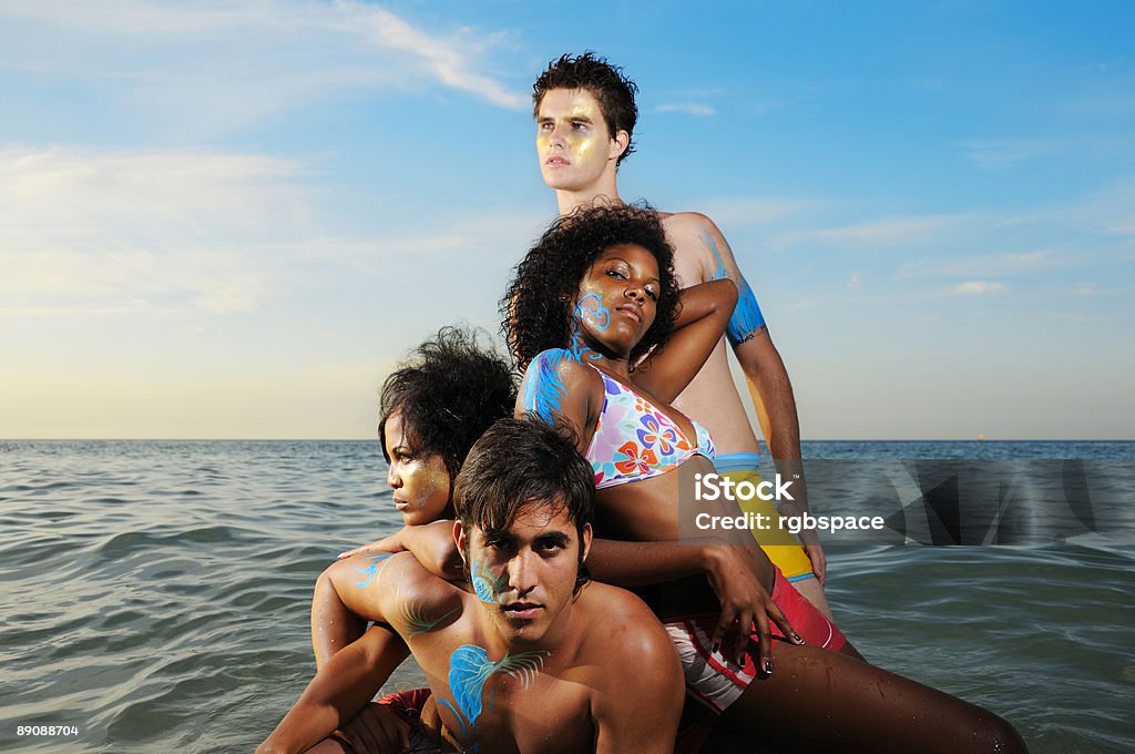 Multiracial team on the beach  Beach Stock Photo