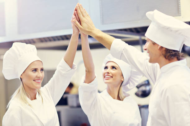 istock Busy chefs at work in the restaurant kitchen 890906866