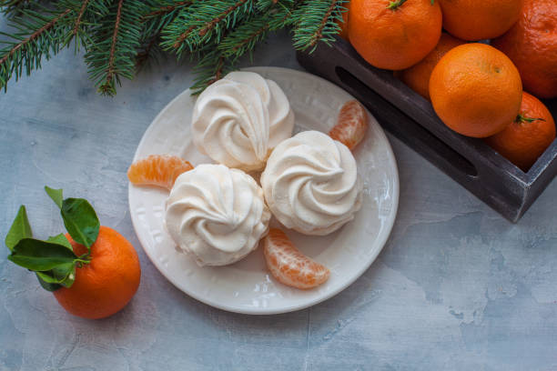 istock Tangerines flavour marshmallows or zephyr Christmas treat 890908914