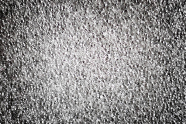 istock White soft cloth surface as background. Abstract white texture. Closeup view. Darker from the centre 890913878