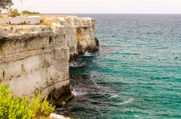 View of the bay of the small southern Italian town of Otranto with its sunny beach and wonderful blue water.