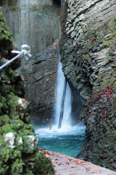istock Wooden path to the waterfall Kozjak 890935720