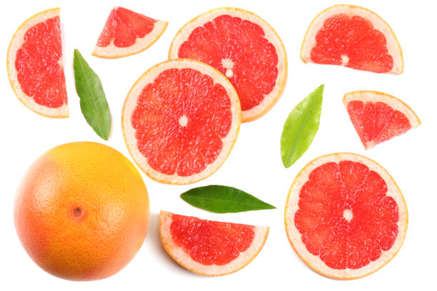istock healthy food. sliced grapefruit isolated on white background top view 890939906