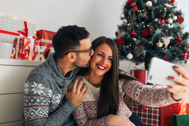 istock Christmas kisses 890963808