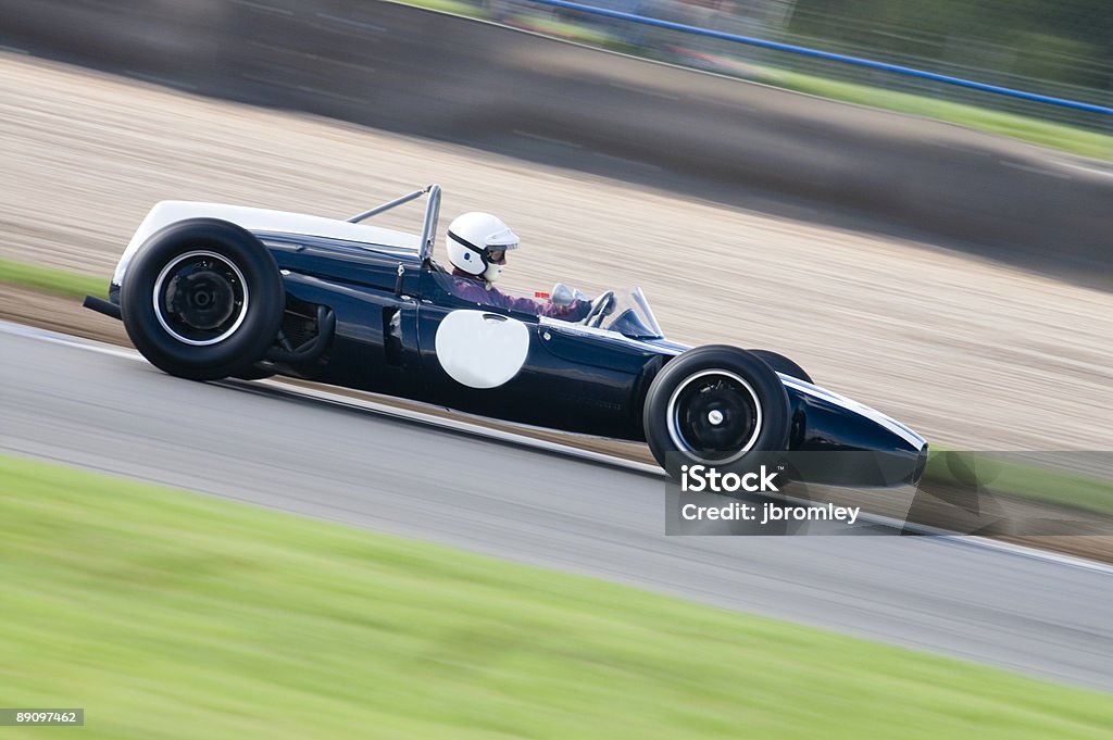 Grand Prix Car 1960s open-wheel single-seater racing car in action on track  Car Stock Photo