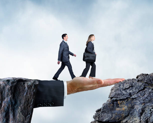 istock Businessman's Hand Bridges The Gap 890977196