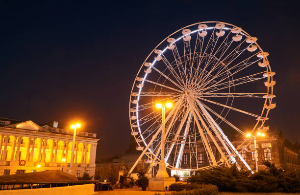 istock Construction and wagons of the  Ferris wheel 890981352