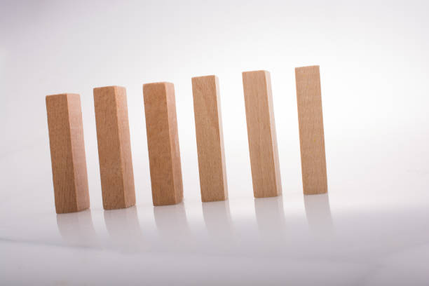 istock Wooden domino blocks on white background 890986002
