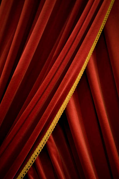 Red velvet stage theater curtains stock photo