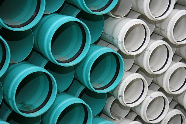 istock Green and White PVC Sewer Pipe 89099117