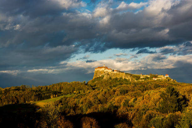 istock Castle Riegersburg in Austria at Sunset 890995320