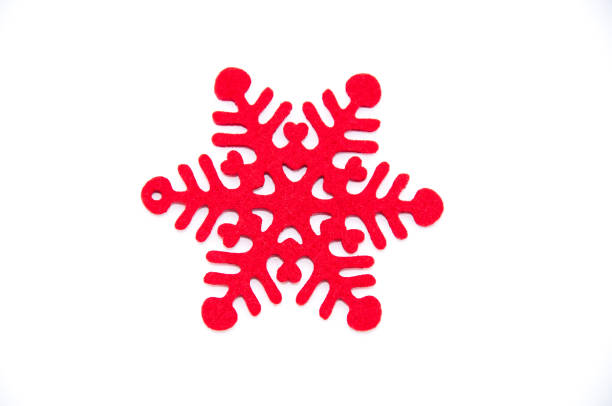 istock Red Christmas snowflake on the white background 890995452