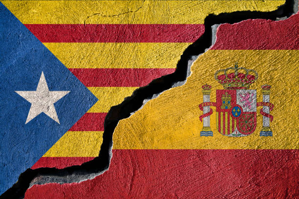 istock Concept Catalonia and Spain flag on cracked background 891002880