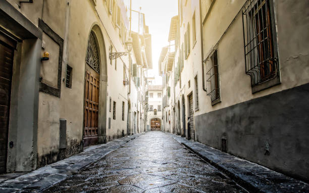 istock Small old street in Florence 891003074