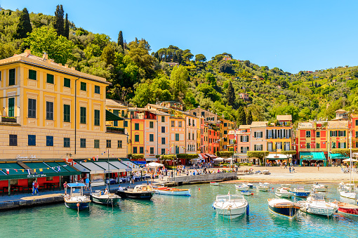 PORTOFINO, ITALY - MAY 4, 2016: Beautiful harbour of Portofino, an Italian fishing village, Genoa province, Italy. A vacation resort with celebrity and artistic visitors.