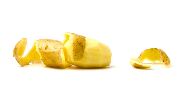 istock Peeled potatoes on a white background. 891026506