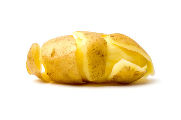 istock Peeled potatoes on a white background. 891029898