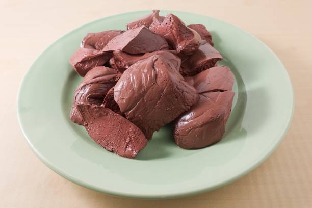 istock Boiled Pig Blood Curd on A Green Dish 891038484