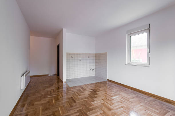 istock Empty room with walls and wooden floor 891042224