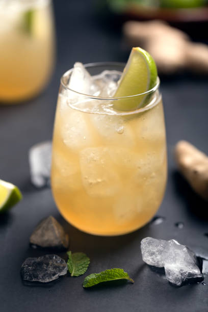 Fresh cocktail prepared with ginger beer, lime and ice
