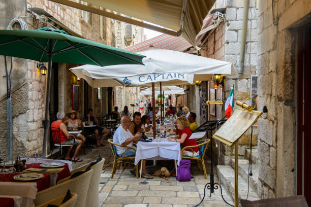 DUBROVNIK, CROATIA - AUG 21, 2014: Small restaurant of the Old town of Dubrovnik, Croatia. Dubrovnik is a UNESCO World Heritage site