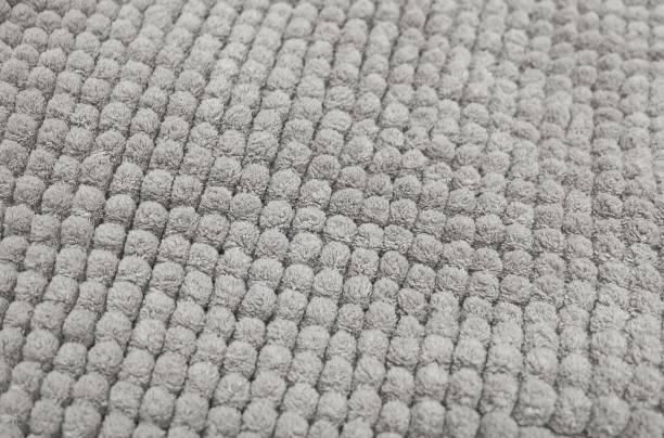 istock Detail of Gray Fluffy Fabric Texture Background 891044972