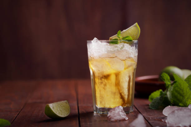 istock Fresh cocktail prepared with ginger beer, lime and ice 891049382