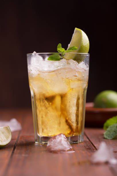 istock Fresh cocktail prepared with ginger beer, lime and ice 891050194