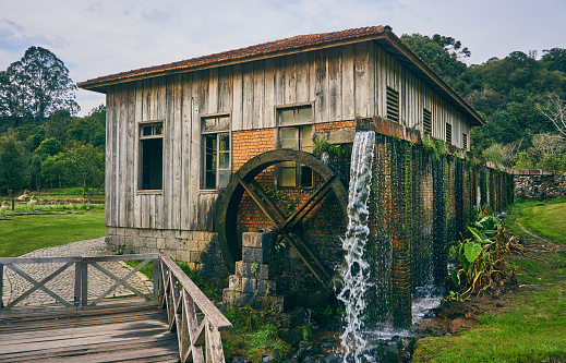 Bento Gonçalves, Rio Grande do Sul, Brazil - August 12th 2017 - Water mill at the entrance of the House of the Yerba Mate, tourist point of the Stone Paths, in the Serra Gaúcha in the city of Bento Gonçalves, Rio Grande do Sul, Brazil.