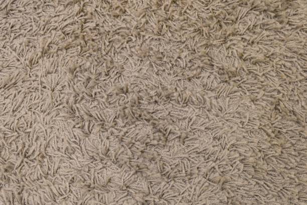 istock Detail of Gray Fluffy Fabric Texture Background 891057634