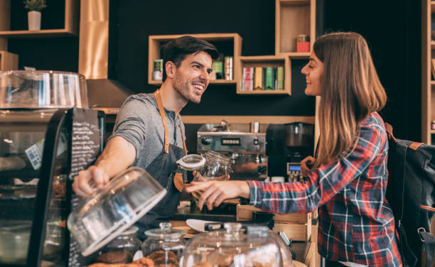 istock Woman buying cookies 891062028