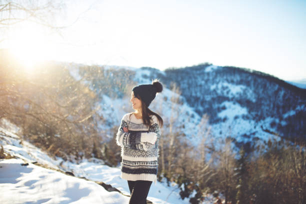 Women enjoy the view of winter landscape