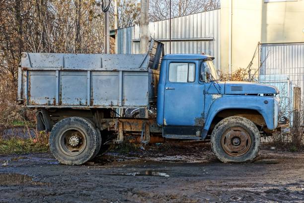 istock empty freight old car stands on the streets in the mud 891080764