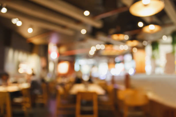 istock Restaurant cafe or coffee shop interior with people abstract blur background 891103068