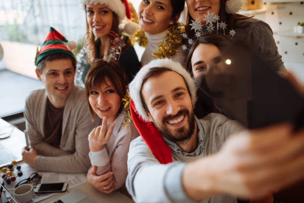 istock Christmas selfie with my team 891118248