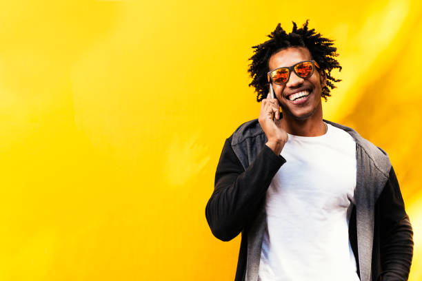 istock Portrait of handsome afro man using his mobile. 891126490