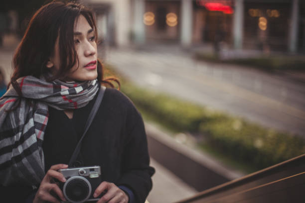 istock Female photographer 891126636