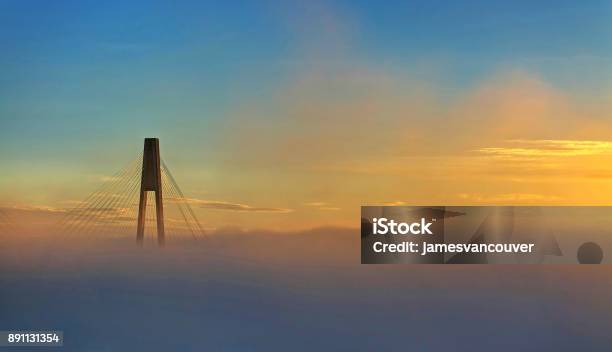 Bridge Tower With Fog At Sunrise Stock Photo - Download Image Now - British Columbia, New Westminster, Surrey - British Columbia
