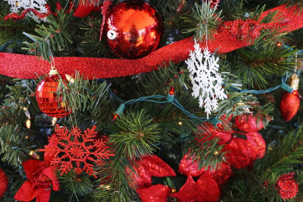 istock Christmas Tree decorated with Red and White Snowflakes 891148100
