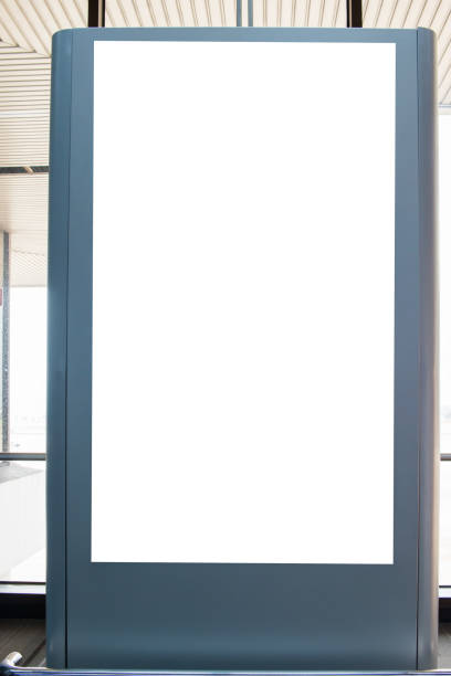 istock Blank billboard advertising panel in terminal airport, Mock up white, insert for text of customer. Space for texting in products or promotional at airport,train station,advertising public commercial. 891153224
