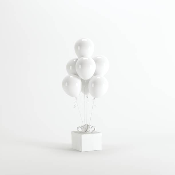 istock White gift box with white balloon on white background. minimal Christmas new year concept. 891156012