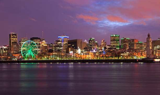 istock Montreal skyline illuminated at dusk and Saint Lawrence River 891166836