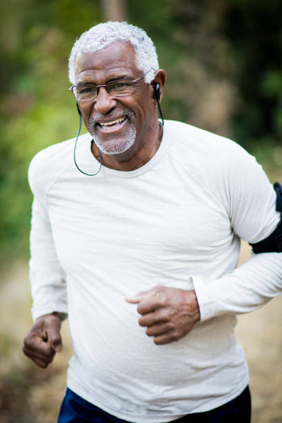 istock Senior African American Man Jogging 891169792