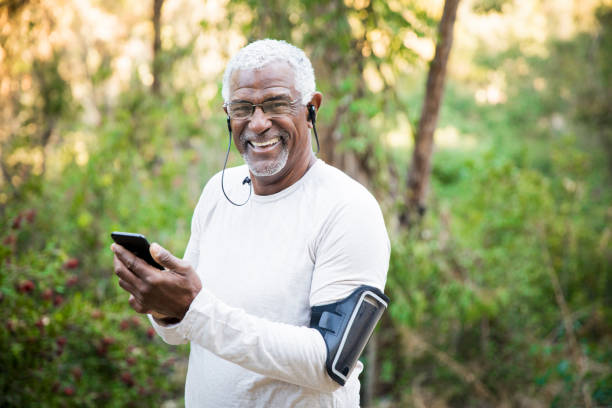 istock Senior African American Man Checking Phone 891169802