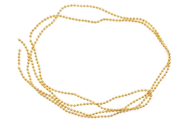 istock Golden bright beads border isolated on white background. 891172364