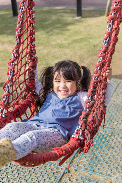 istock Father and girl playing in the park 891172930